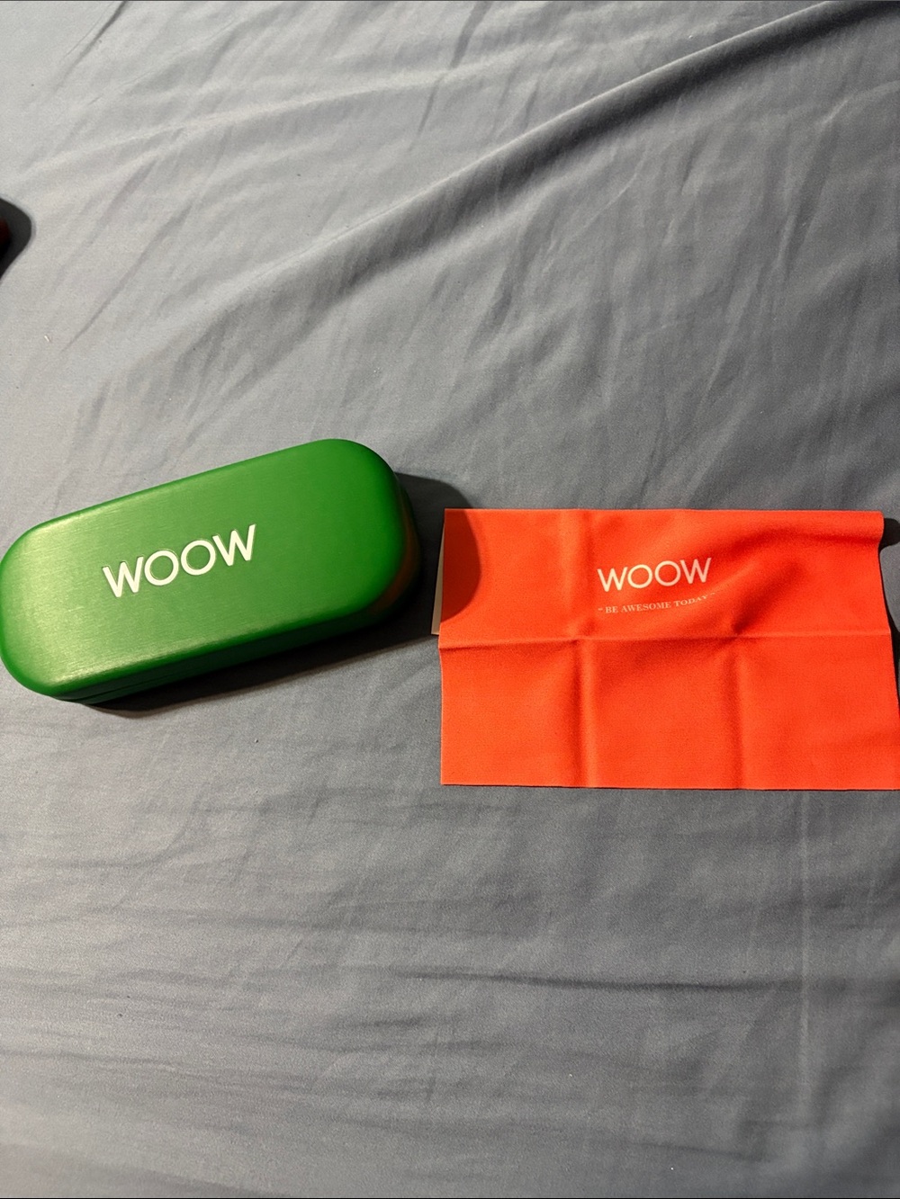 Green Eyeglass Case with Orange Cleaning Cloth